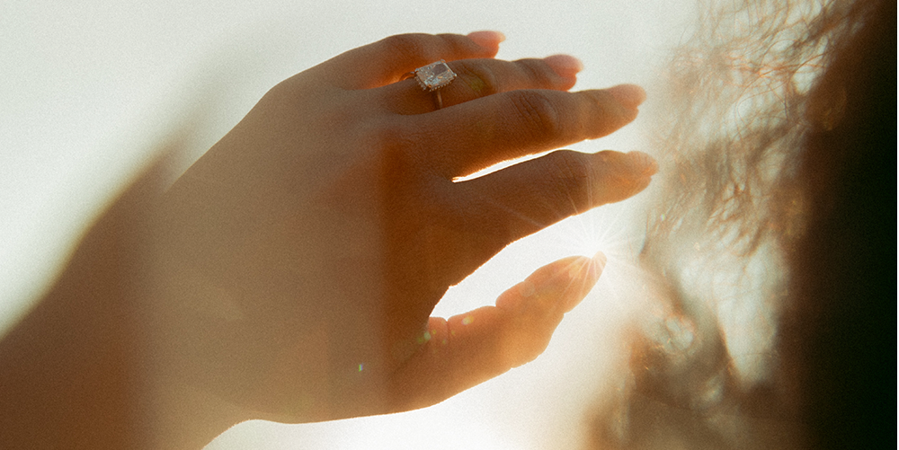 diamond ring on woman's hand