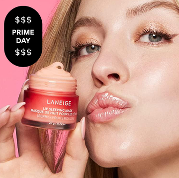 sydney sweeney holding a jar of lip balm next to her face